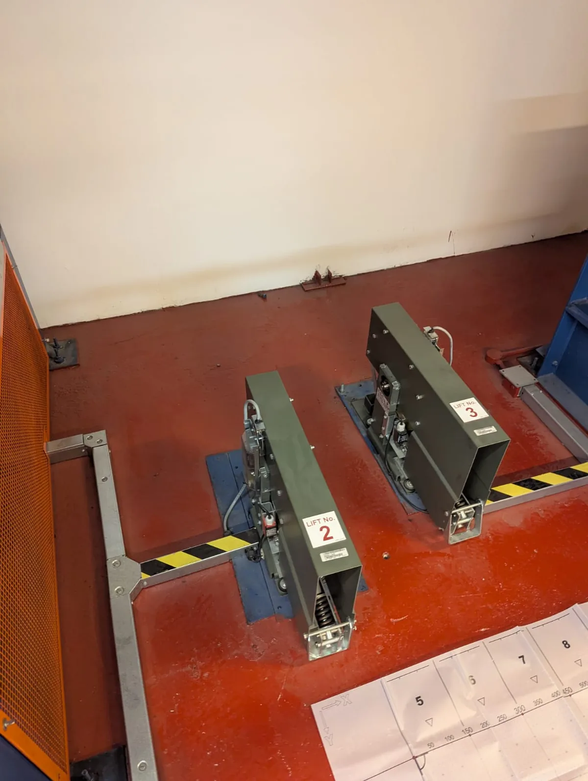The lift machine room, with the motors being replaced during the modernisation