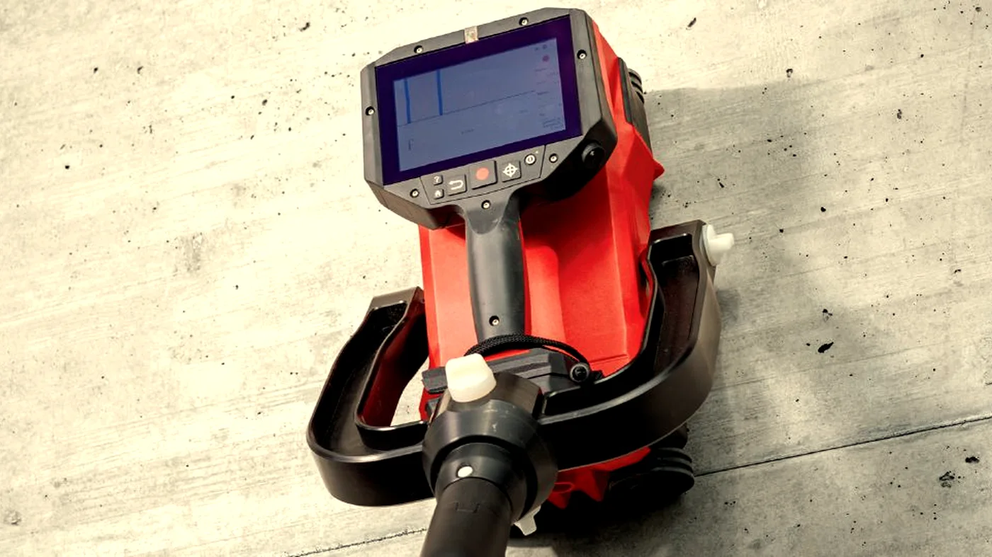 Operative on scaffolding scanning an elevated concrete slab with Hilti PS300 GPR equipment
